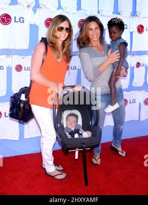 23. Juni 2012 Beverly Hills, Ca. Jillian Michaels, Partnerin Heidi Rhoades, Tochter Lukensia und Sohn Phoenix LG Electronics laden zum „20 Magic Minutes: A Family Cebray“ ein, um die neue Turbowasch-Waschmaschine mit großer Kapazität auf einem privaten Anwesen zu starten Stockfoto