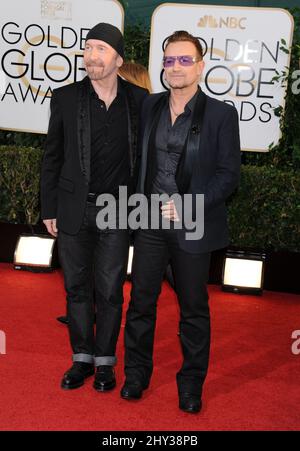 The Edge & Bono nehmen an den jährlichen Golden Globe Awards 71. Teil, die am 12. Januar 2014 im Beverly Hilton Hotel stattfinden. Stockfoto