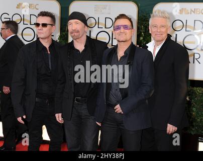 U2 nehmen an den jährlichen Golden Globe Awards 71. Teil, die am 12. Januar 2014 im Beverly Hilton Hotel stattfinden. Stockfoto