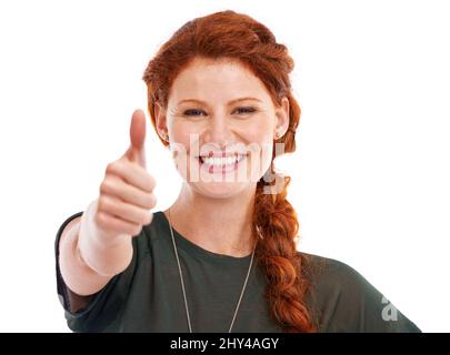 Grünes Licht geben. Eine kurze Aufnahme einer schönen jungen Frau mit Daumen nach oben. Stockfoto