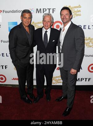 George Clooney, Michael Douglas, Hugh Jackman bei der Jubiläumsfeier „Hollywood's Night Under the Stars“ 95. auf dem MPTF Wasserman Campus in Los Angeles, USA. Stockfoto