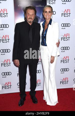 Johnny Hallyday und Laeticia Hallyday kommen zur Weltpremiere von „Rules Don't Apply“ am Eröffnungsabend des AFI Fest 2016 am Donnerstag, den 10. November 2016 in Los Angeles. Stockfoto