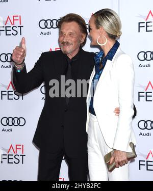 Johnny Hallyday und Laeticia Hallyday kommen zur Weltpremiere von „Rules Don't Apply“ am Eröffnungsabend des AFI Fest 2016 am Donnerstag, den 10. November 2016 in Los Angeles. Stockfoto