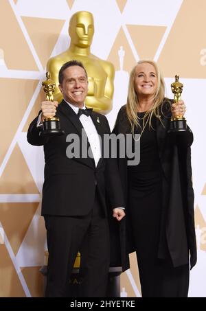 Lee Unkrich und Darla K. Anderson im Pressesaal der Academy Awards 90. Stockfoto