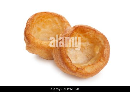 Studioaufnahme von gebackenen Yorkshire Puddings, die vor einem weißen Hintergrund ausgeschnitten wurden - John Gollop Stockfoto