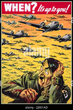 WW2 Plakat der Rekrutierungspropaganda 'Wann? Es liegt an Ihnen! Karikatur-Karikatur von Adolf Hitler, die nach einem massiven Luftangriff 1941 in Kanada ein Rekrutierungsposter für Rekrutierung erhielt Stockfoto