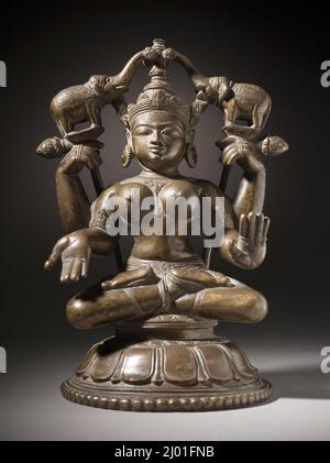 Shri Lakshmi von Elefanten (Gaja-Lakshmi). Indien, Odisha (Orissa), 18.. Jahrhundert. Skulptur. Messing Stockfoto