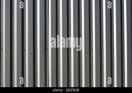 Schöne helle Baumaterialien, lockige helle und dunkle Linien mit Schatten. Stockfoto