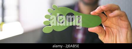 Co2-Fußabdruck-Schild Co2 Reduzierung. Grüne Umwelt Stockfoto