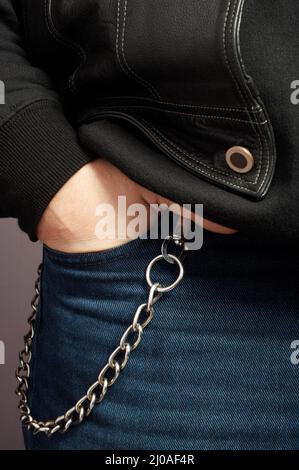 Hand in einer Tasche Stockfoto