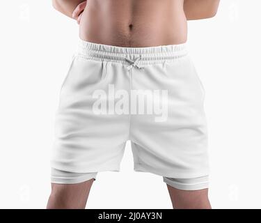 Modell aus weißen, lockeren Shorts mit einer Kompressionslinie aus Unterhosen, Krawatten an der Taille, Sportswear auf einem Mann, isoliert auf dem Hintergrund. Struktureller Unterschor Stockfoto