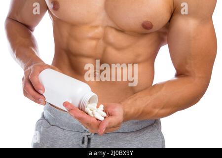 Doping anabole Steroide Tabletten Drogen Pillen Missbrauch Bodybuilder Muskeln Mann Stockfoto