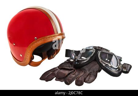 Vintage Motorhelm mit Brille und Handschuhe isoliert auf weißem Hintergrund Stockfoto