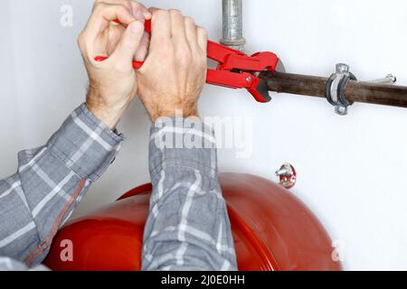 Arbeiten an Rohren Stockfoto