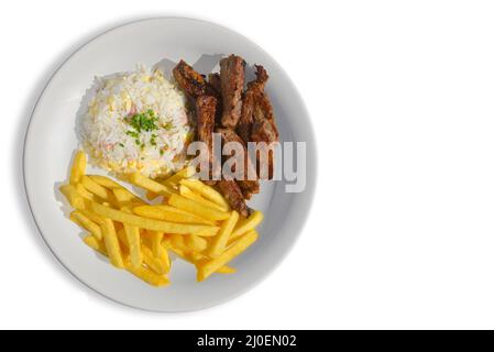 Steak in Scheiben mit Reis und Pommes frites Stockfoto