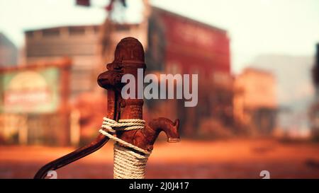 Alte verrostete Wasserpumpe in der Stadt Wild West Stockfoto