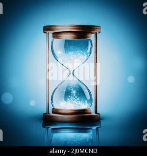 Sanduhr mit leuchtendem Licht Stockfoto
