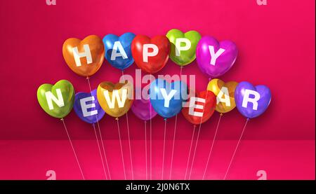 Bunte fröhliche neue Jahr Herz-Form Ballons auf einem rosa Beton Hintergrund. Horizontales Banner Stockfoto