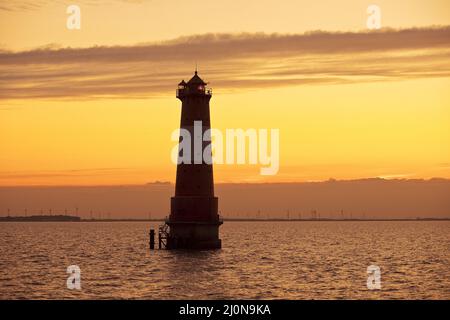 Arngast Leuchtturm bei Sonnenuntergang in Jagebusen, Nordsee, Niedersachsen, Deutschland, Europa Stockfoto