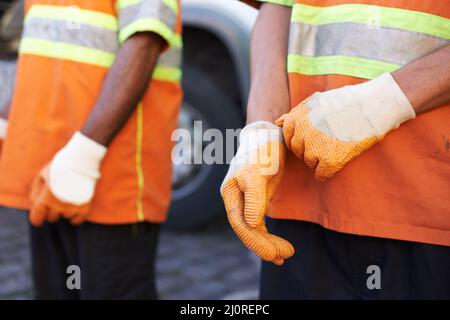 Die Stadt sauber halten. Eine Aufnahme eines Teams von Müllsammlern. Stockfoto