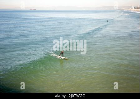 Stand-up Paddlebander Surfen. Stockfoto