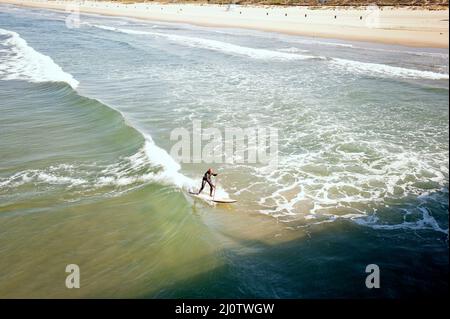 Stand-up Paddlebander Surfen. Stockfoto