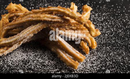 Köstliche gebratene Churros mit Zucker-Blick. Hochwertige Fotos Stockfoto