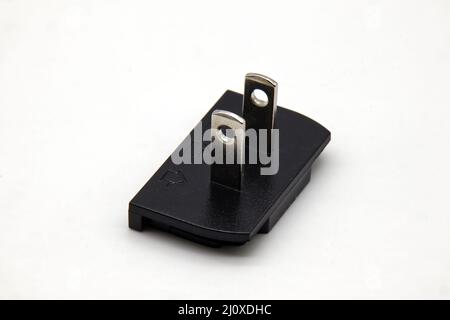US-Steckeradapter, isoliert auf weißem Hintergrund Stockfoto