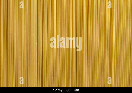 Nahaufnahme ungekochte Spaghetti. Hochwertiges, schönes Fotokonzept Stockfoto