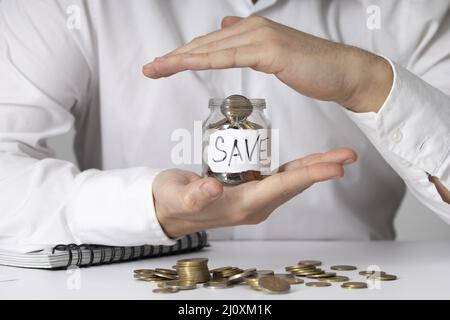 Geld sparende JAR-Anordnung. Hochwertiges, schönes Fotokonzept Stockfoto