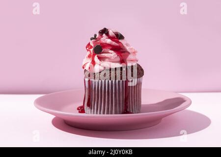 Köstlicher Cupcake mit Glasur. Hochwertige Fotos Stockfoto