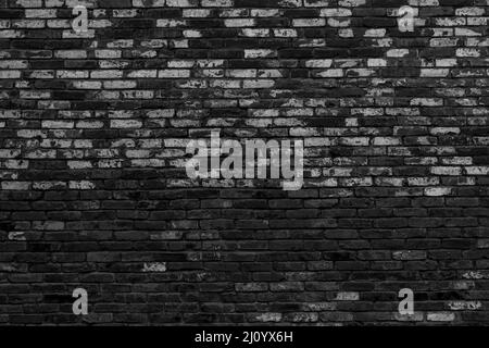Schwarze Backsteinmauer. Interieur eines modernen Loft. Hintergrund für Design Stockfoto