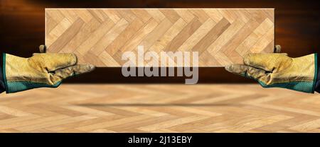 Zwei Hände mit schützenden Arbeitshandschuhen, die eine Holzparkettprobe aus Fischgrätholz auf einem ähnlichen Boden mit Platz für Kopien halten. Stockfoto