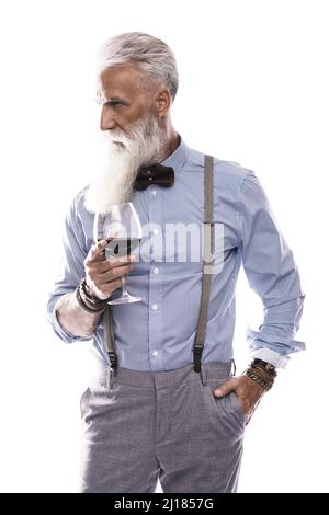Hübsch gealtertes männliches Modell posiert auf weißem Hintergrund Stockfoto