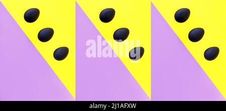 Schwarze Eier auf dem gelben und violetten Hintergrund. Ostern, Vielfalt, geometrisch, Muster, Lebensmittelkonzept Stockfoto