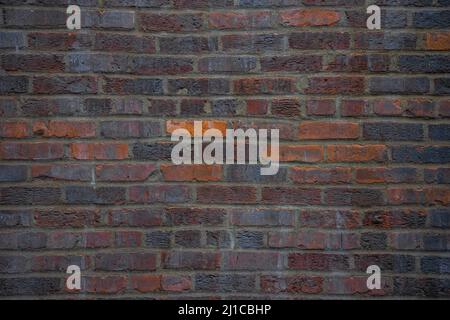 Schöne Ziegelwand mit einer Vielzahl von Farben und Texturen. Stockfoto