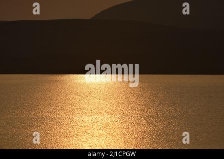 Sonnenuntergang über loch Glow Perthshire Stockfoto