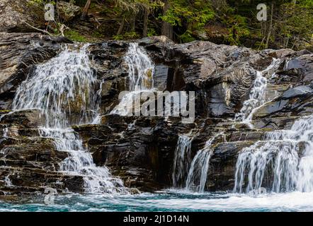 Die Sacred Dancing Cascades auf McDonald Creek, Glacier National Park, Montana, USA Stockfoto