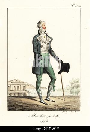 Modischer Dandy oder Incroyable, französische Directoire-Ära, 1795. In kurzen redingote, hoher Kragen und Kravatte, gestreifte Weste und Schlauch, grüne Hosen, mit einem Zylinderhut und Knudgel. Costume d'un jeune homme. 1795. Handkolorierte Lithographie von Lorenzo Bianchi und Domenico Cuciniello nach Hippolyte Lecomte aus Costumi civili e militari della monarchia francese dal 1200 al 1820, Neapel, 1825. Italienische Ausgabe von Lecomtes zivilen und militärischen Kostümen der französischen Monarchie von 1200 bis 1820. Stockfoto