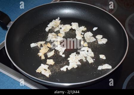 Speck in der Pfanne Stockfoto