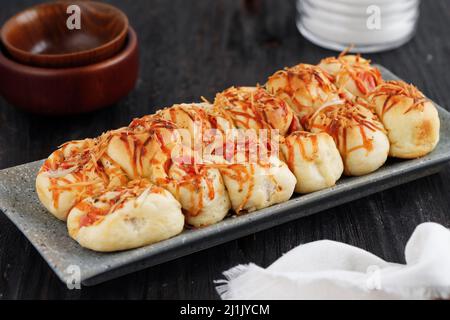 Ausgewählte Schwerpunkte hausgemachte Pull Apart Pizza Roll Brot mit Käse Stockfoto