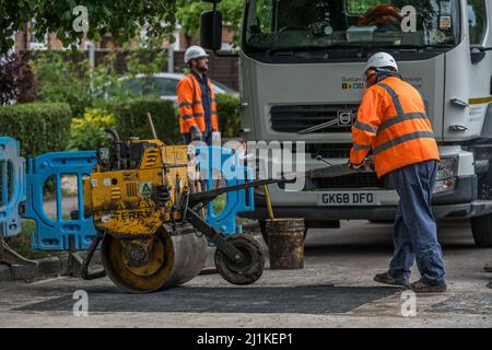 Reparatur Von Asphaltwalzen Stockfoto