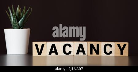 Stellenausschreibung Wort auf Holz Block geschrieben. Stellenausschreibung text auf Holz- Tabelle für Ihr Design, Konzept. Stockfoto