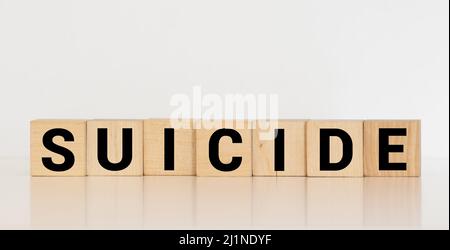 Selbstmord - Wörter aus Holzblöcken mit Buchstaben Stockfoto