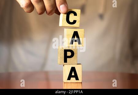 Wörter CAPA-korrigierende und präventive Aktionspläne. Stockfoto