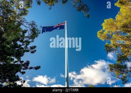 Australische Flagge winkt in der Luft Stockfoto