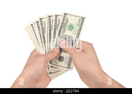 Stapel 100 Dollar in der Hand auf Weiß halten. Stockfoto