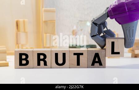 BRUTAL Wort auf Bausteine Konzept geschrieben. Stockfoto