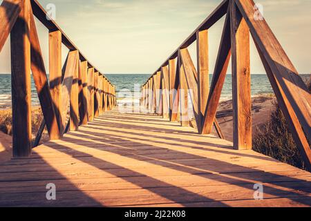 wooden access to get to the sandy beach Stockfoto