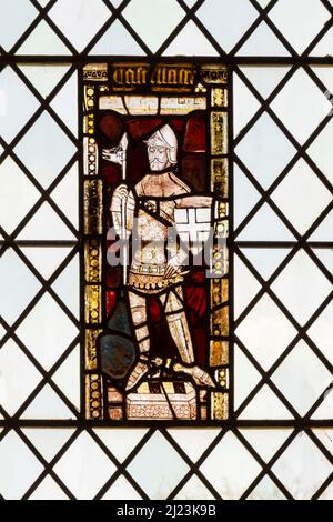 Mittelalterliche Glasmalerei von St. George in der St. James' Kirche in Castle Acre, Norfolk. Stockfoto